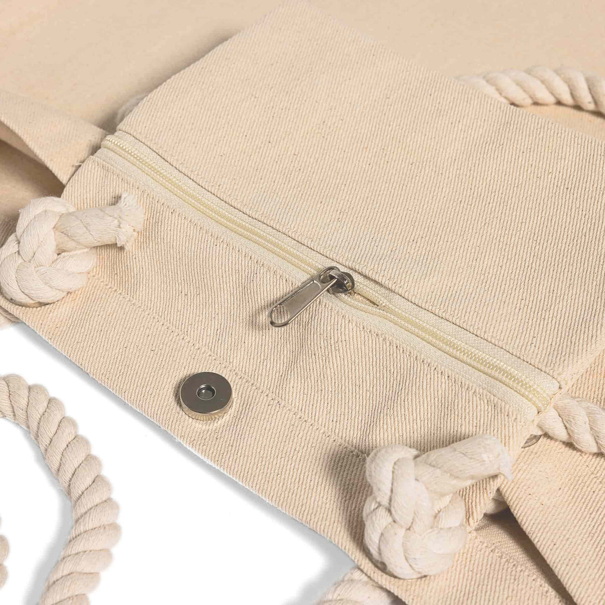 canvas tote magnetic snap and zipper detail