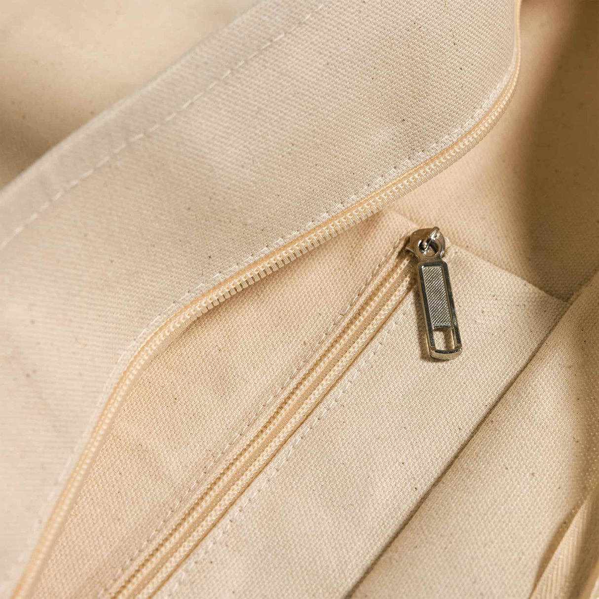 Heavy canvas zippered tote pocket detail