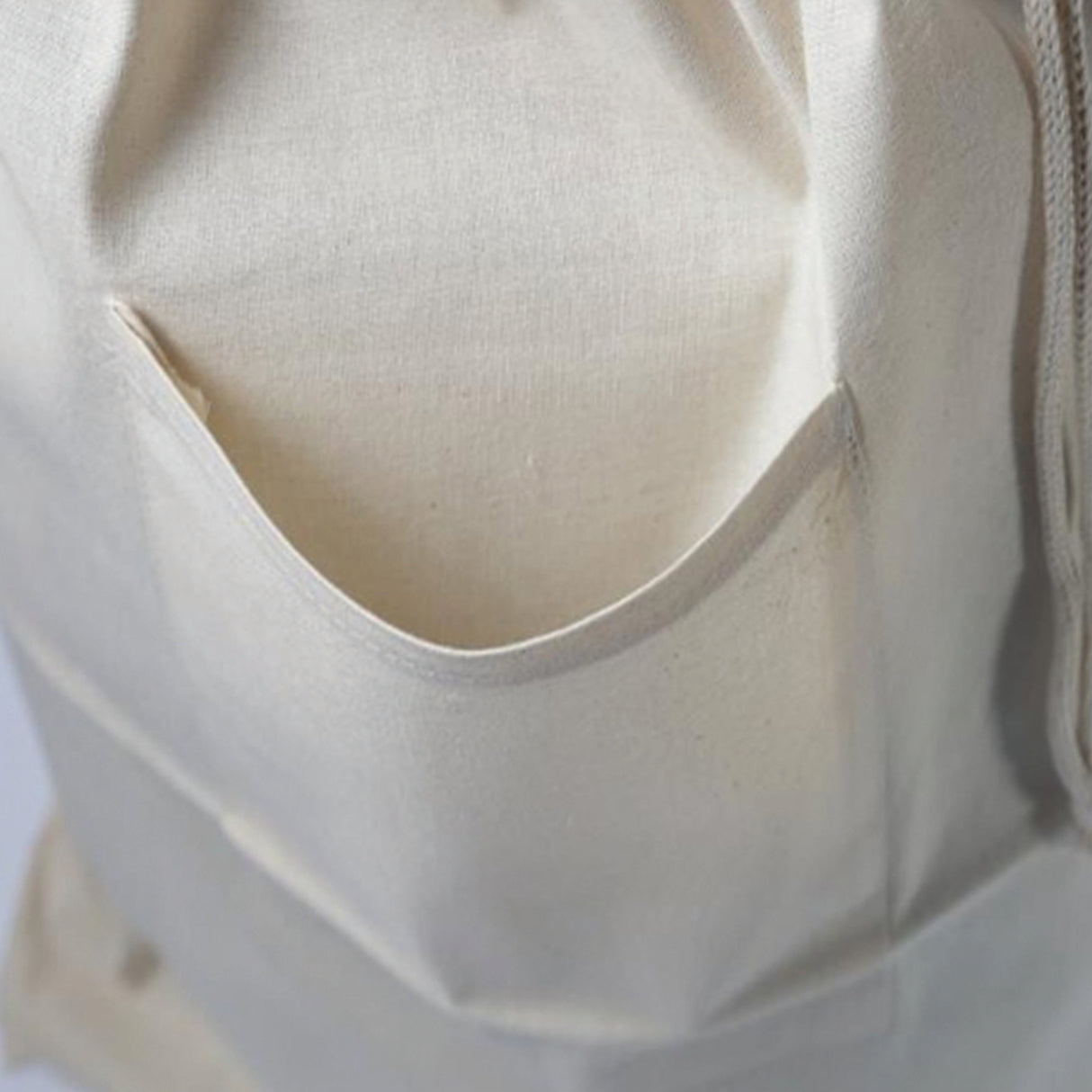natural-cotton-laundry-bag-front-pocket-detail