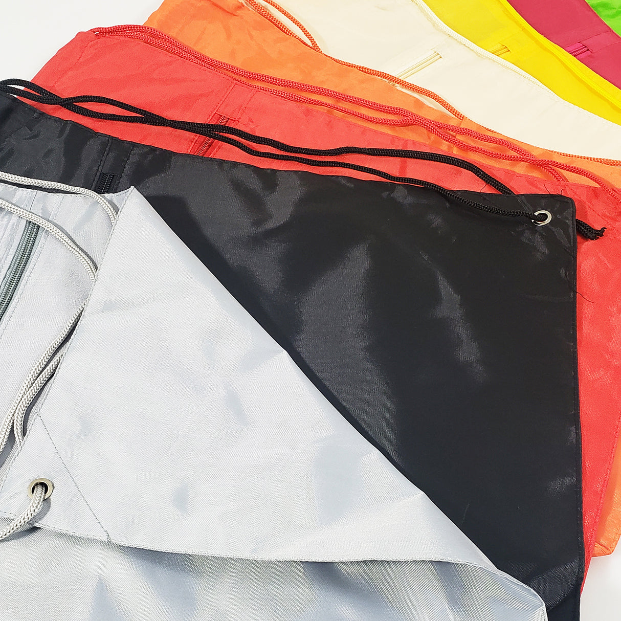 96 ct Promotional Polyester Drawstring Bags with Front Pocket -ASSORTED COLOR PACK (CLOSEOUT)