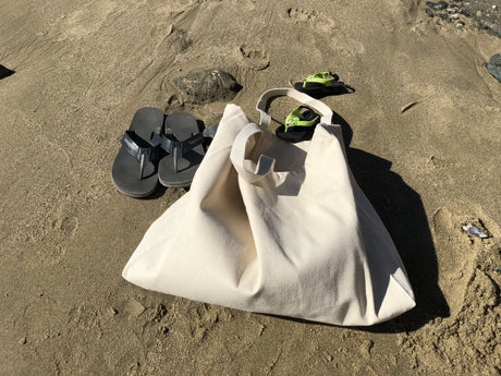 canvas tote bags at the beach