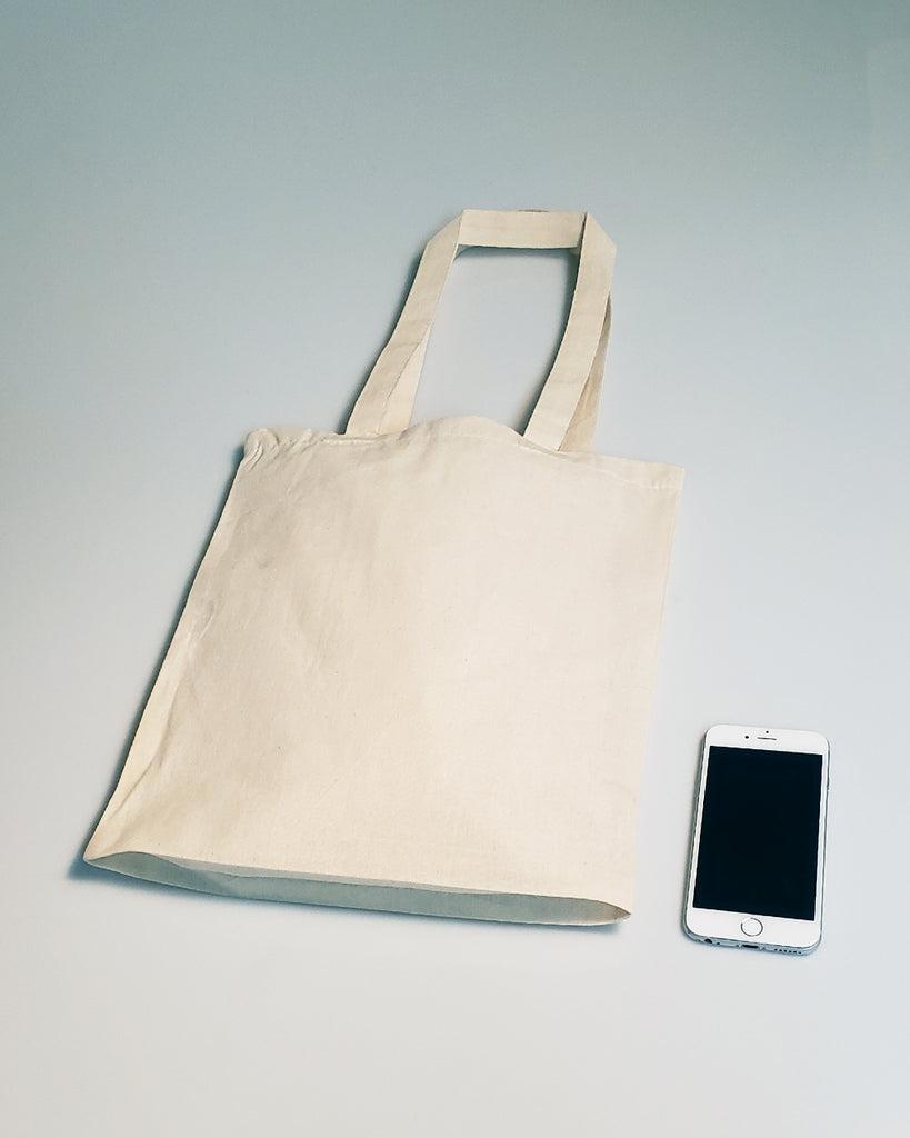 Premium Photo | Heap of reusable small cotton bags